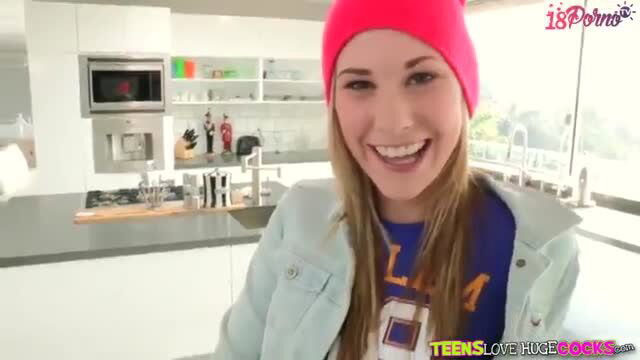 Bluebxbyyy smiles in pink wool beanie and denim jacket in kitchen