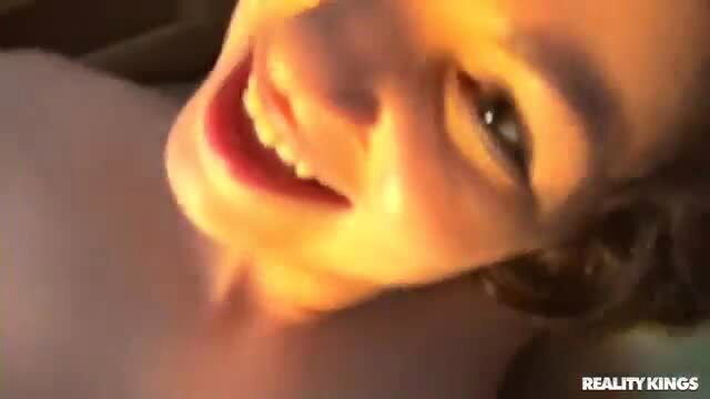 Nina Turk smiling in car with Tyler Steel, Reality Kings brunette hookup