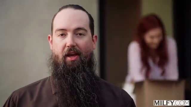 Phoenix Marie watches bearded man from behind box in Milfy scene