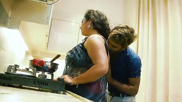 Big ass Indian stepmom hugged from behind in kitchen by stud