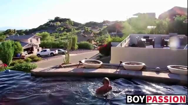 Tyler Thayer shirtless in pool, blonde twink solo poolside scene