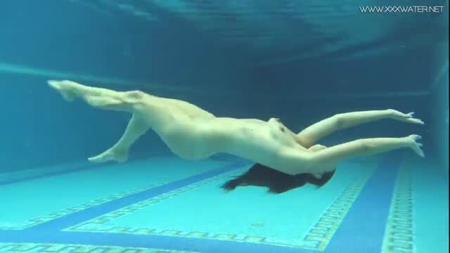 Naked Euro MILF with big ass swimming underwater in erotic pool scene