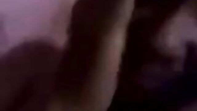 Blurry Indonesian couple kissing passionately before sex