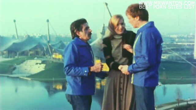 Playgirls of Munich: 70s blonde with two men outdoors at stadium