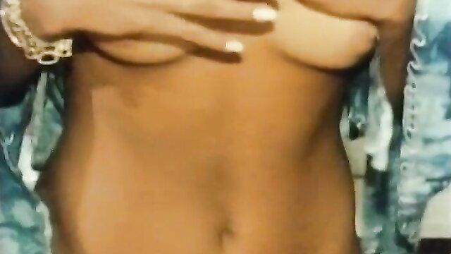 Curvy Indian babe flashes natural tits in open blouse closeup