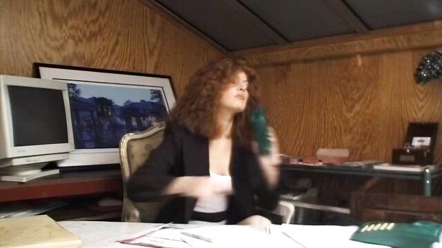 Silvia Saint on phone in office, redhead Euro babe in blouse