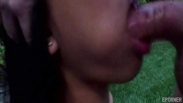 Amoral black girl passionately sucking cock outdoors closeup