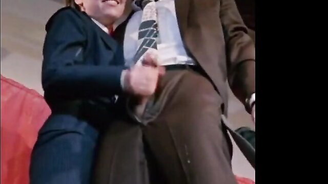 Paula Meadows grabs cock in suit, spunk flow bukkake scene