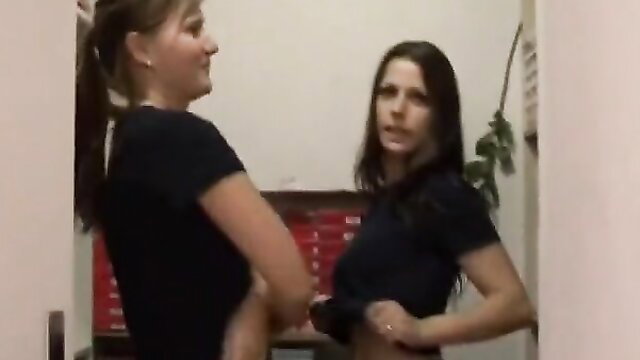 Two fit brunettes in tight black tees, teasing pose in amateur sex for cash scene