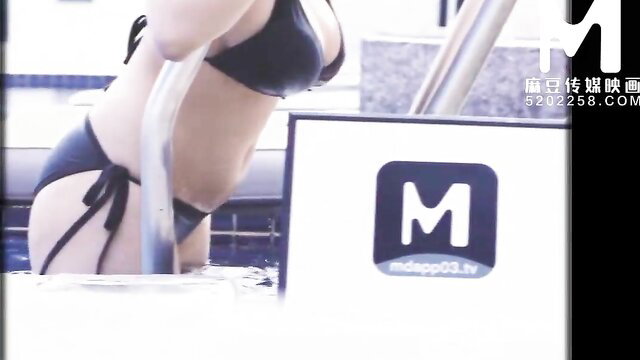 Busty Asian goddess in skimpy black bikini by pool, Madou Media
