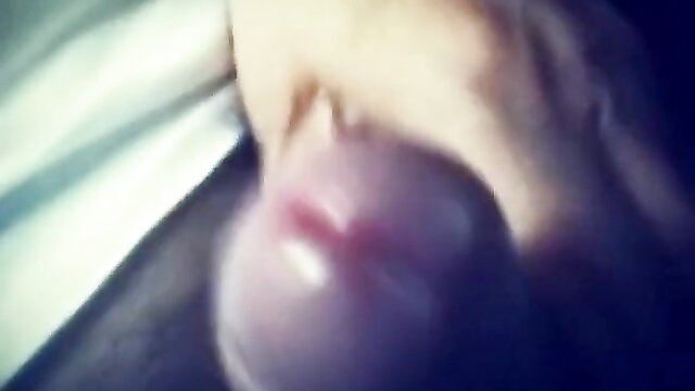 Closeup of Asian woman's glossy pink lips and tongue in old dude Chinese glasses video