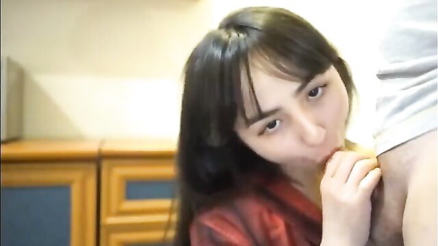Cute Uyghur girl with bangs eagerly sucking cock closeup