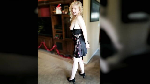 Mature blonde akapetwife in sexy black silk dress, curvy MILF tease