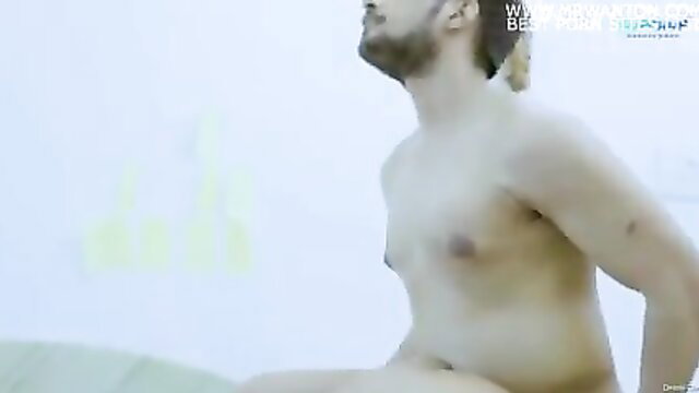 Hot shirtless Indian man with ponytail sitting nude, sexy javani pose
