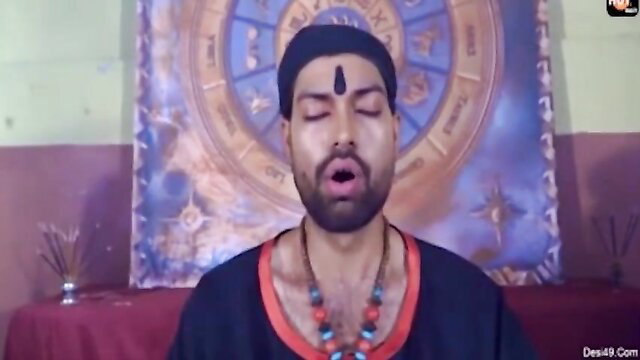 Indian guru in tilak and beads chants in mystical setup porn thumbnail