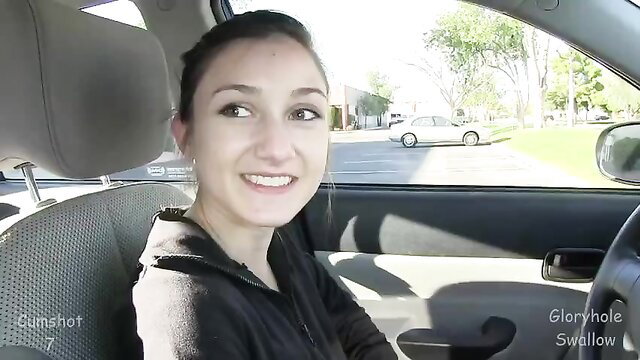 Claire Evans smiling in car on 3rd gloryhole visit