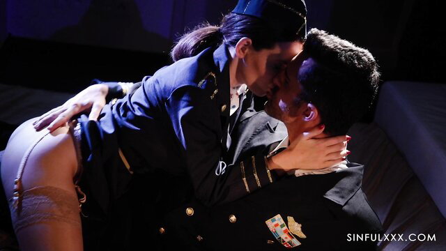 Anna De Ville in navy uniform passionately kisses Marco Bull, stockings upskirt