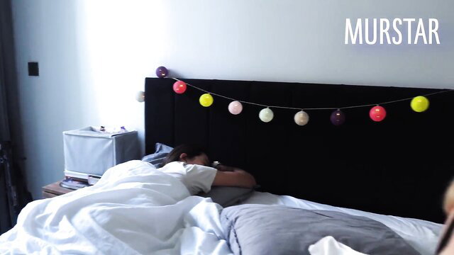 Blonde hottie sleeping in bed, cuckold hubby nearby
