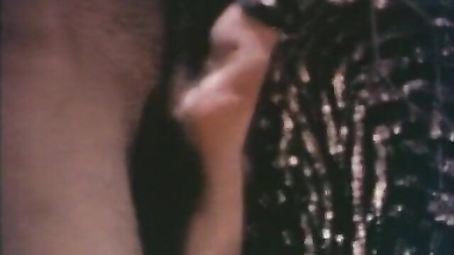 Joanna's romantic French classic: closeup of hand gripping hairy cock