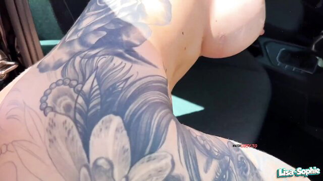 Lisa Sophie topless tattooed neck showing huge tits in car POV