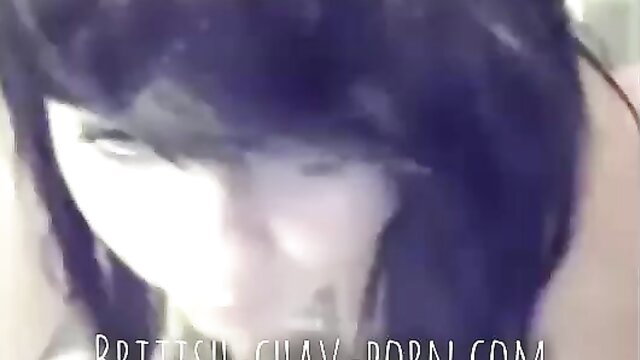 Naughty British chav teen with purple hair sniffs fingers closeup
