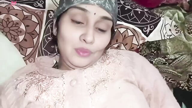 Indian Bhabhi in headscarf pouts seductively on bed, New Year pussy fuck tease