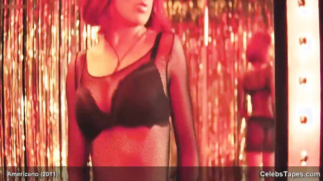 Salma Hayek in sheer black lingerie, red hair, exposed curves