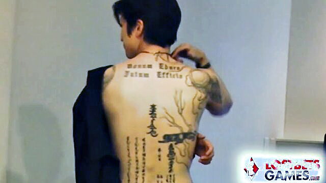 Zayda J shows off intricate back tattoos in Lost Bets Games scene