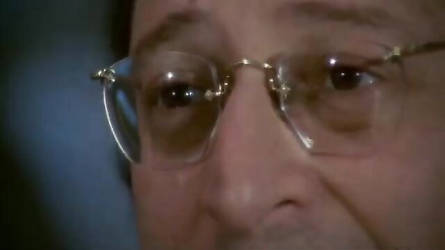 Vintage Asian man in glasses close-up, retro JAV thumbnail