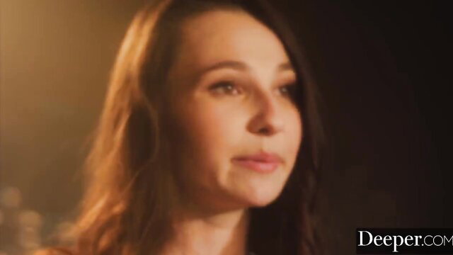 Liz the Lunatic closeup portrait, sultry gaze in Deeper adult video