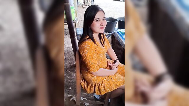Viral Indonesian es dawet seller in floral dress, smiling outdoors