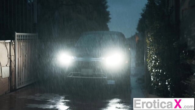 Ebony beauty in rainy night car scene, EroticaX seduction
