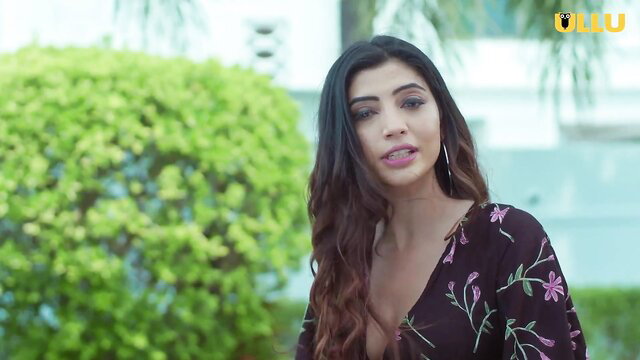 Indian beauty in floral dress smiles seductively outdoors, Dunali Season 1