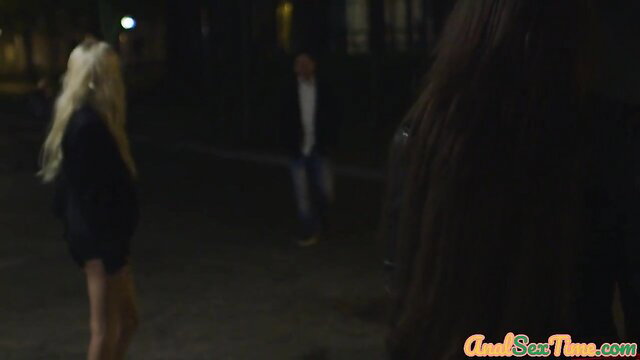 Blonde and brunette babes in dark alley sharing guy in anal 3way