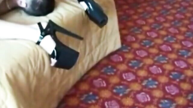 Hot fledgling doll in high heels on bed, teasing anal pose