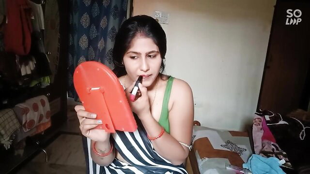 Indian Bangla desi bhabhi Sanjana applying lipstick in saree alone at home
