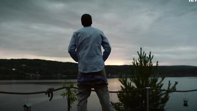 Man pants down rear view overlooking lake, Ellen Helinder nude celeb scene