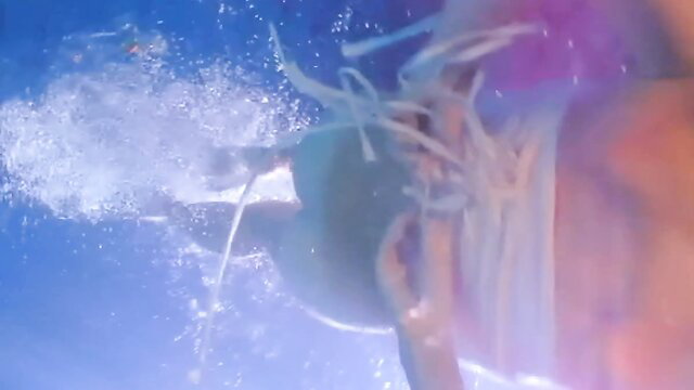 Sabine Timoteo in Pepperminta 2009 swims underwater in swimsuit