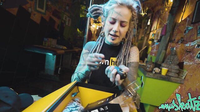 Anuskatzz unboxes Pornhub Rewards 2020 gift, tattooed alt model with dreads