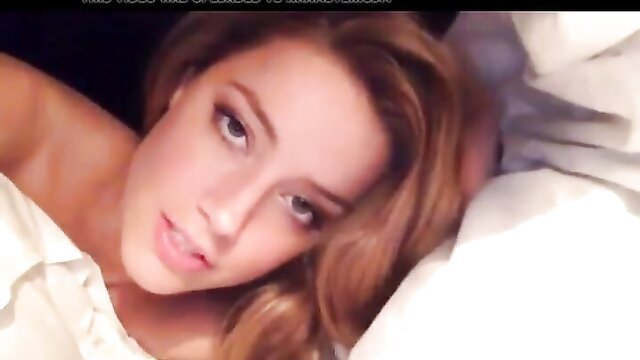 Amber Heard topless in bed, seductive gaze, lesbian favor video