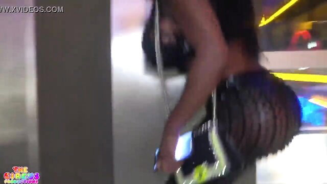 Ebony Mystique's huge fishnet ass in Vegas strip club tease