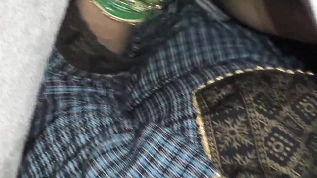 Puja's arm with green bangles in plaid shirt, hairy erotica tease