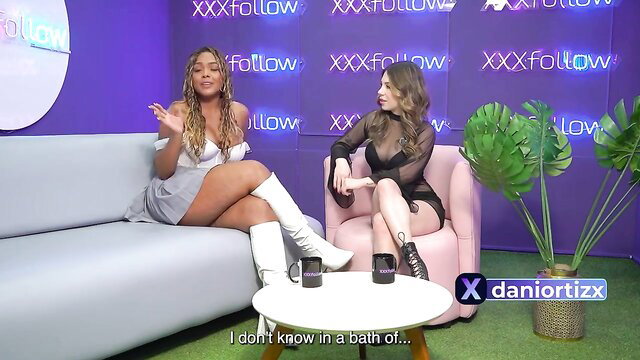 Two hot cougar babes in sexy outfits on XXX Flow talk show