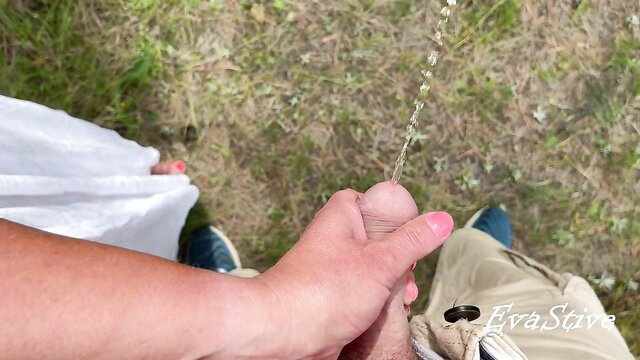 Amateur GF holds BF's cock POV while he pees on grass outdoors