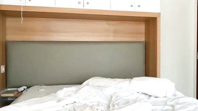 Livsslife amateur bed with messy white sheets closeup