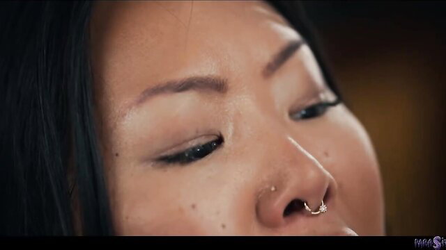 Connie Perignon closeup eyes face with nose ring Parasited alien