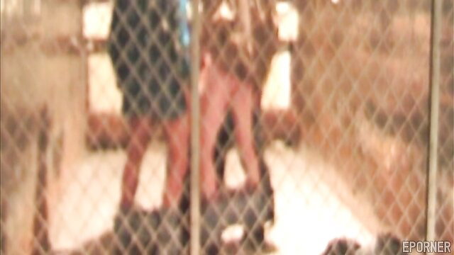 Alluring MILF Lena Romon in horny chain link fence sex pose