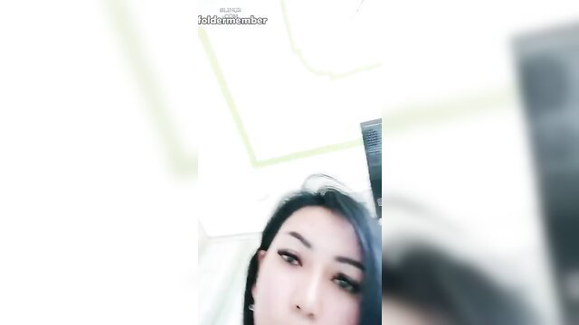 Closeup of sexy Indonesian Tante Kirana's alluring face and eyes