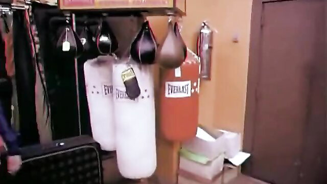 Debbie Does Dallas gym scene with punching bags and boxing gloves