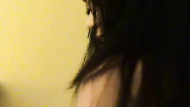 Asian brunette with big tits profile view closeup
